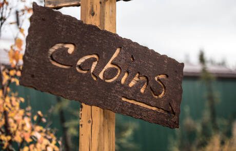 Log cabins sign